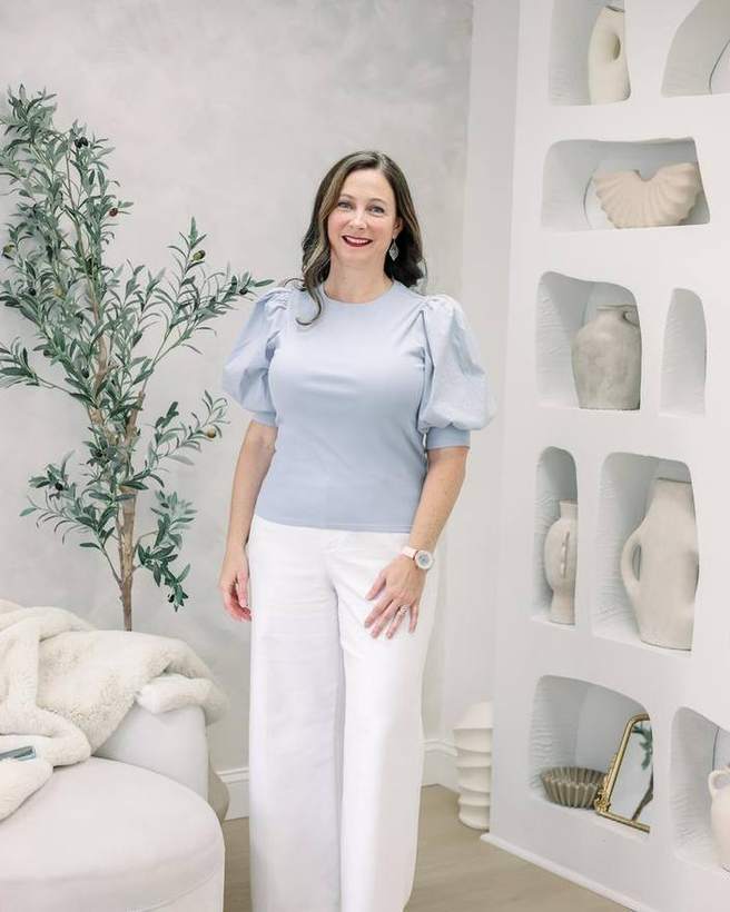 A business owner photographed at a Golden Palm branding session