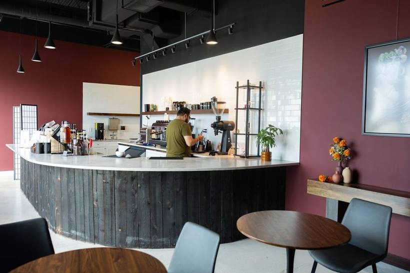 The Obsidian Coffee counter and seating, shot wide