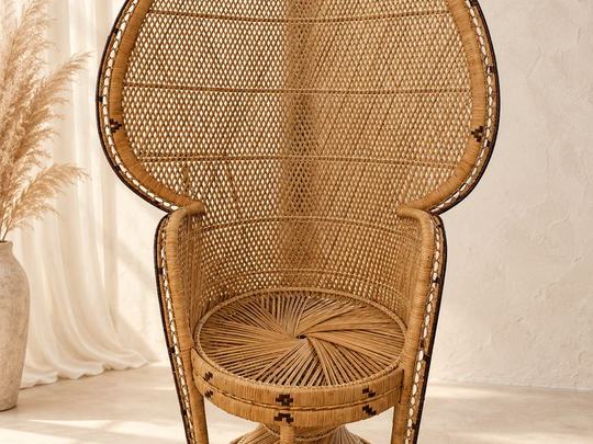 A vintage rattan peacock chair