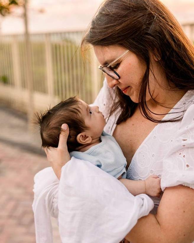 A mother nose to nose with her baby