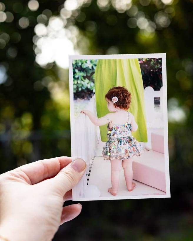 A print of a child, made and handed over at a Golden Palm event